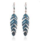 Bronzen dames oorbellen met blauwe beweegbare veer