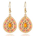 Goudkleurige druppelvorm dames oorbellen multicolor oranje steen