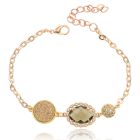Goudkleurige verstelbare dames armband met groen glassteen