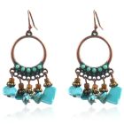 Ronde dames oorbellen met hangers en turquoise steentjes